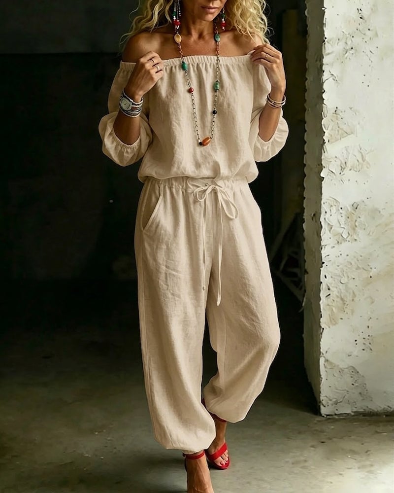 Vivi – Axelbandslös jumpsuit med puffärm