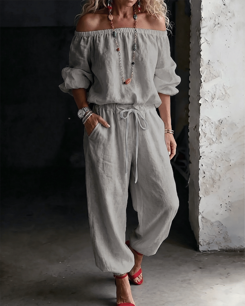 Vivi – Axelbandslös jumpsuit med puffärm