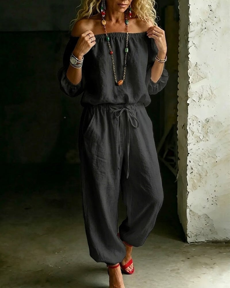 Vivi – Axelbandslös jumpsuit med puffärm