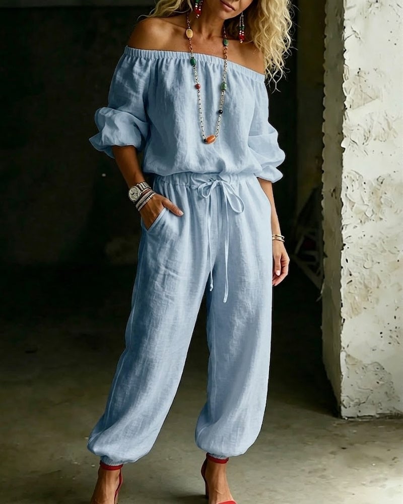 Vivi – Axelbandslös jumpsuit med puffärm
