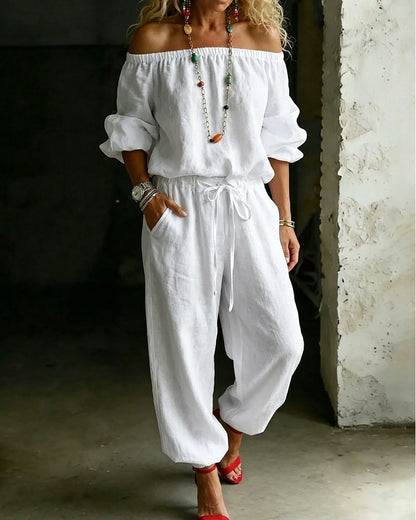 Vivi – Axelbandslös jumpsuit med puffärm