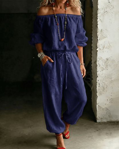 Vivi – Axelbandslös jumpsuit med puffärm