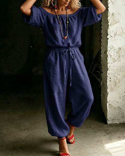 Vivi – Axelbandslös jumpsuit med puffärm