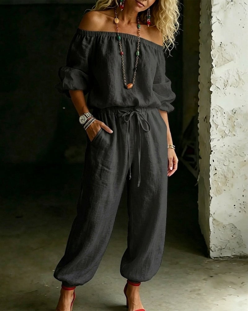 Vivi – Axelbandslös jumpsuit med puffärm