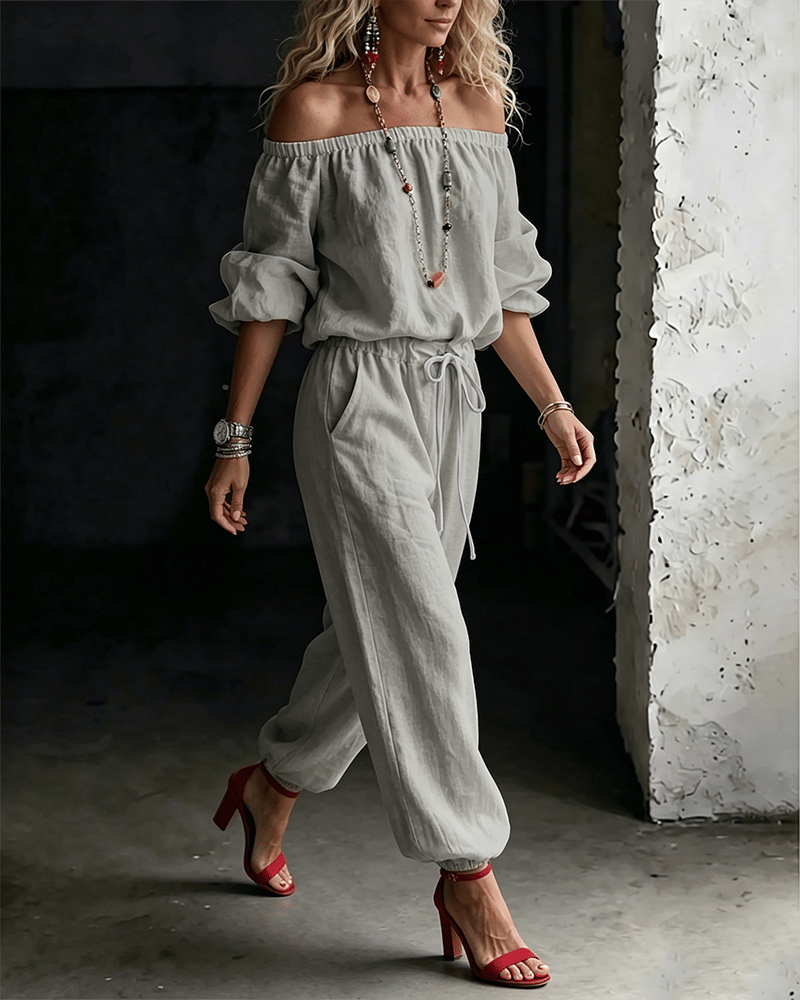 Vivi – Axelbandslös jumpsuit med puffärm