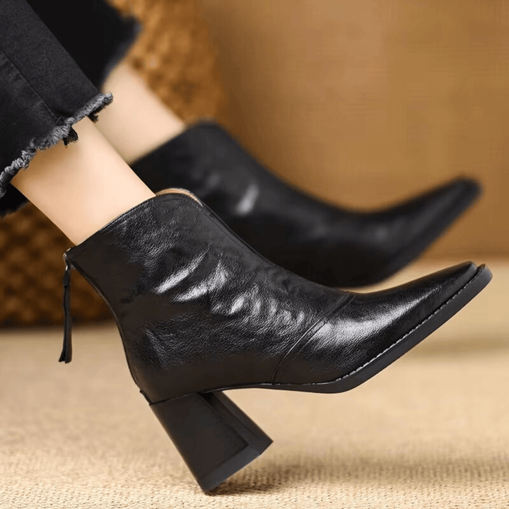 Gun – Eleganta läderankelboots med klack
