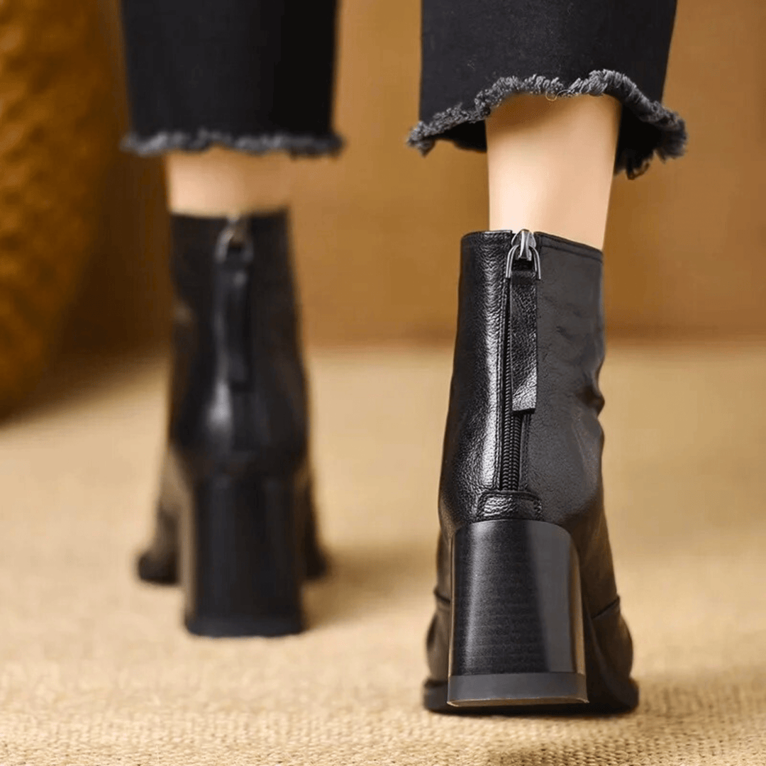 Gun – Eleganta läderankelboots med klack