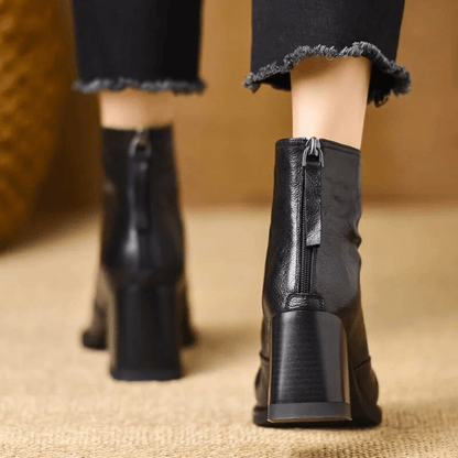 Gun – Eleganta läderankelboots med klack