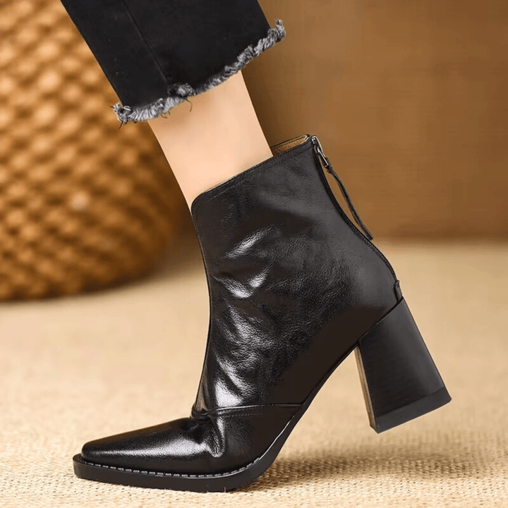 Gun – Eleganta läderankelboots med klack