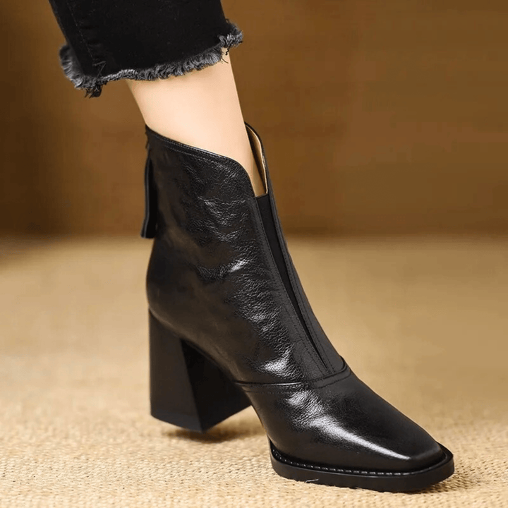 Gun – Eleganta läderankelboots med klack