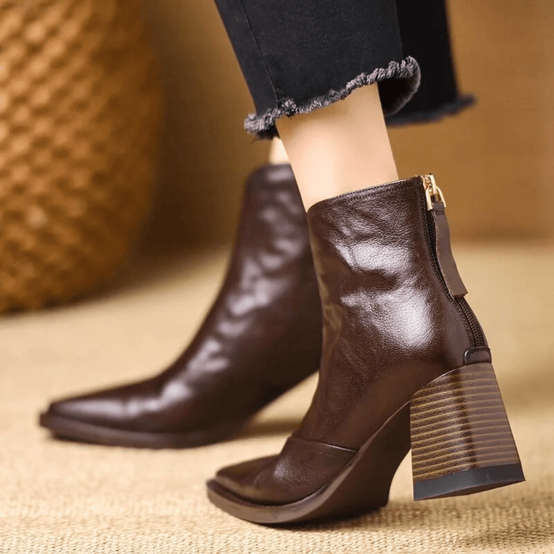 Gun – Eleganta läderankelboots med klack