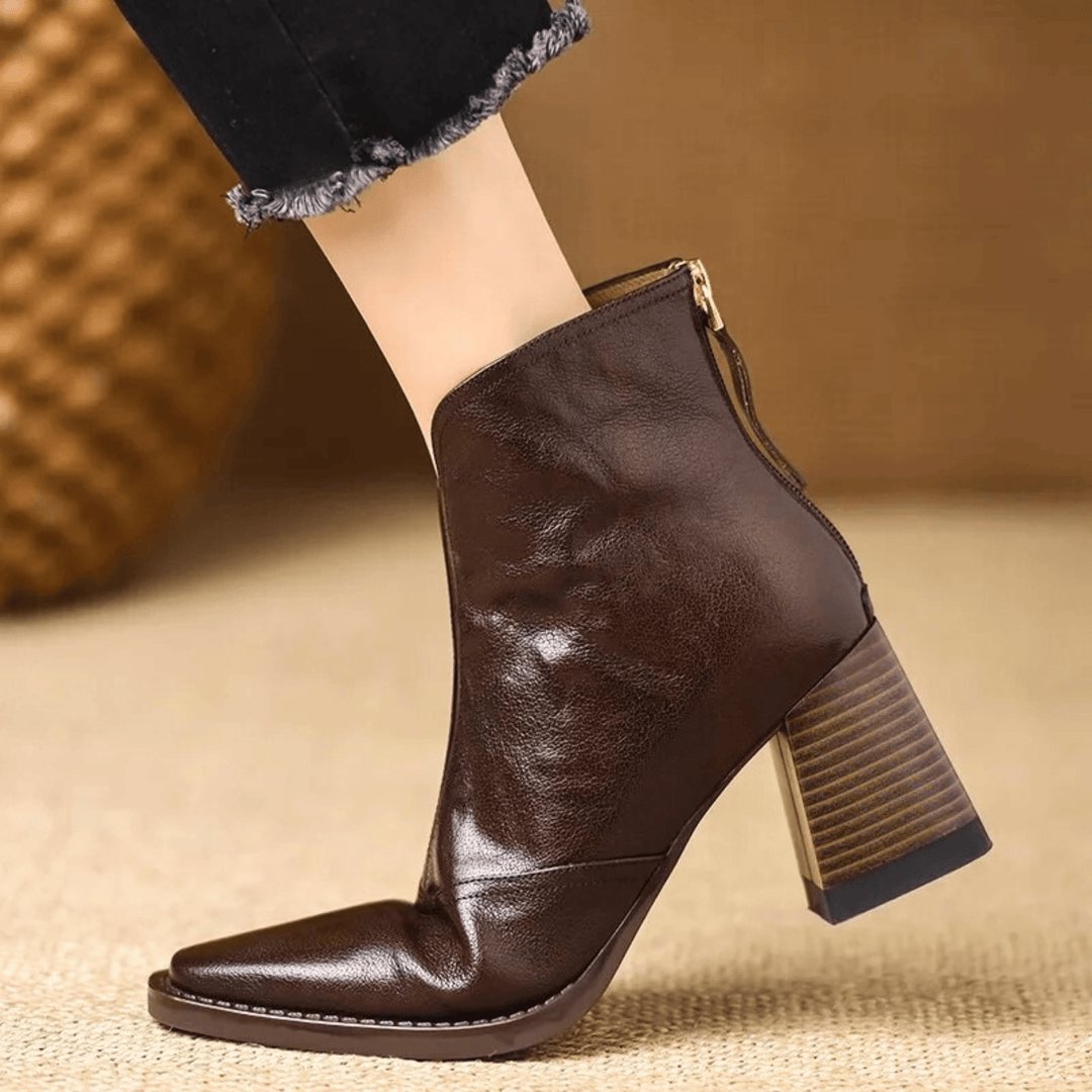 Gun – Eleganta läderankelboots med klack